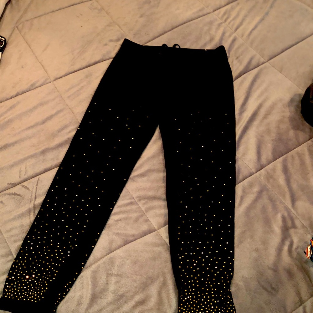 Sweat pants with gold on bottom